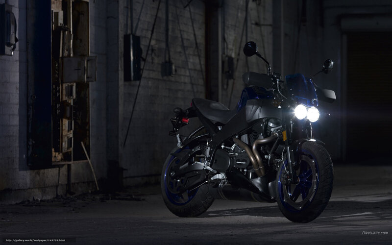 Blue motorcycle in dark garage
