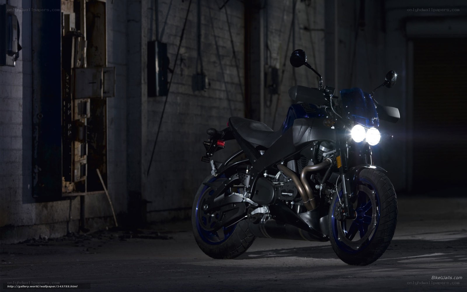 Blue motorcycle in dark garage