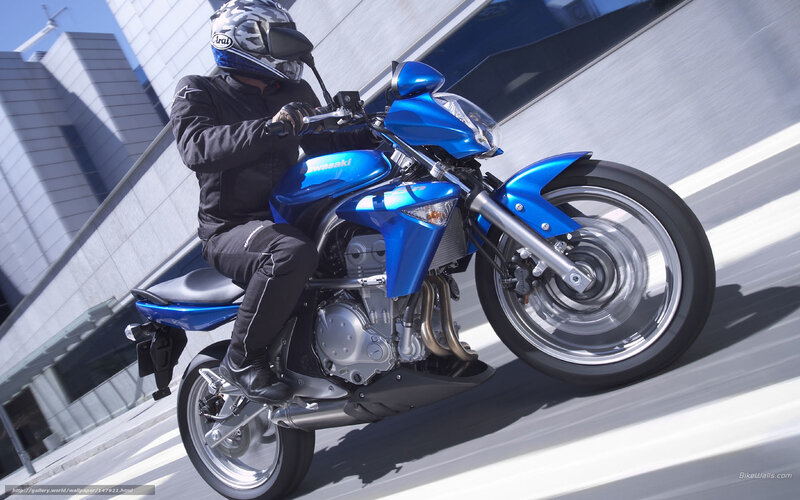 Blue motorcycle in motion