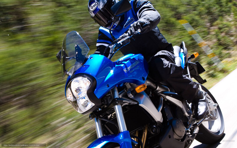 Blue motorcycle in motion