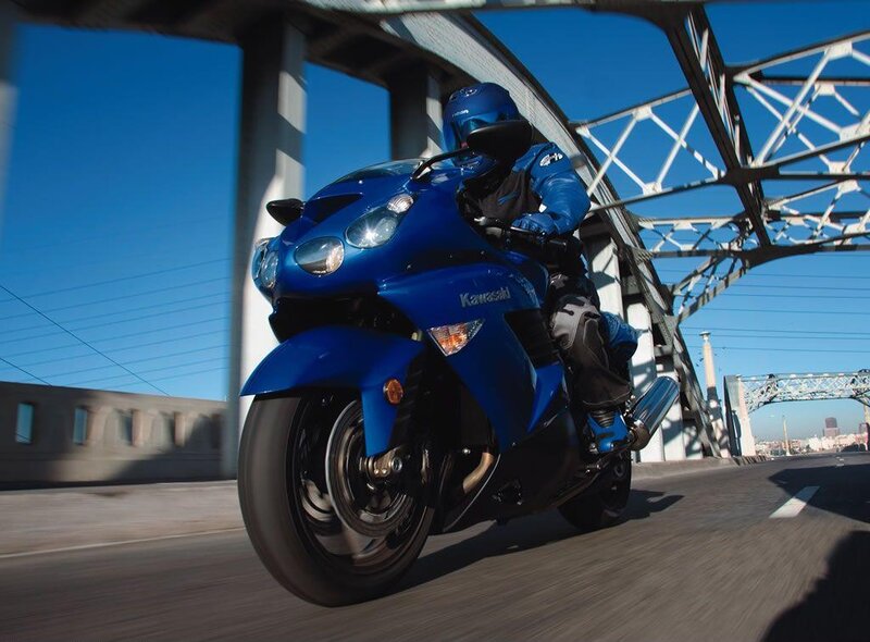 Blue motorcycle on a bridge