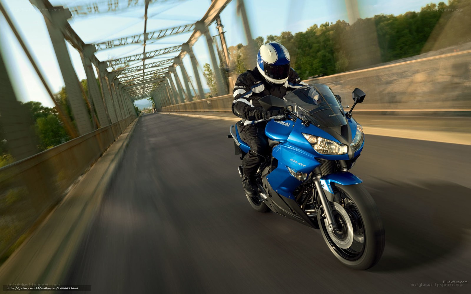 Blue motorcycle on a bridge
