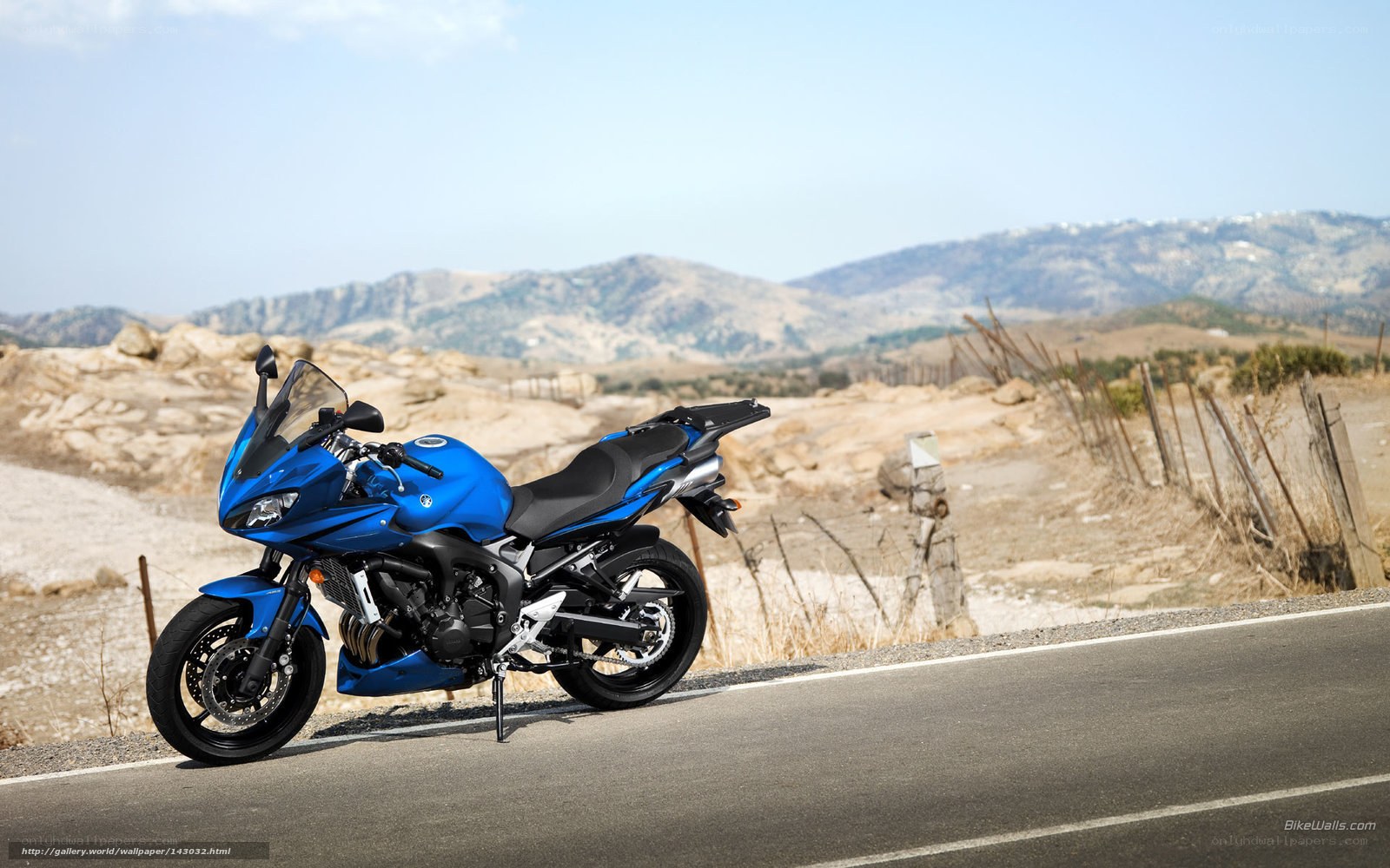 Blue motorcycle on a road