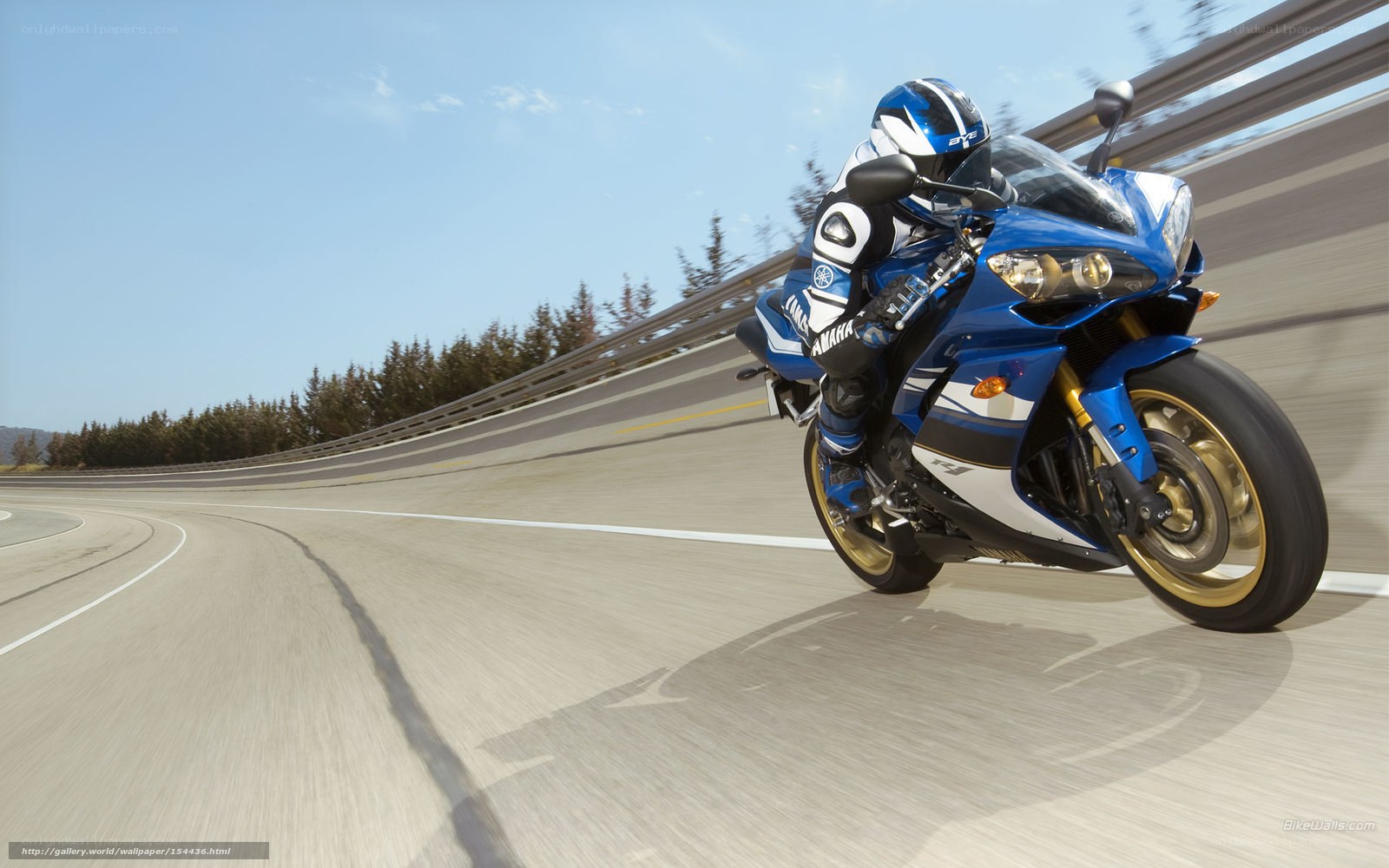 Blue motorcycle on a winding road