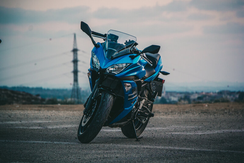 Blue motorcycle on asphalt