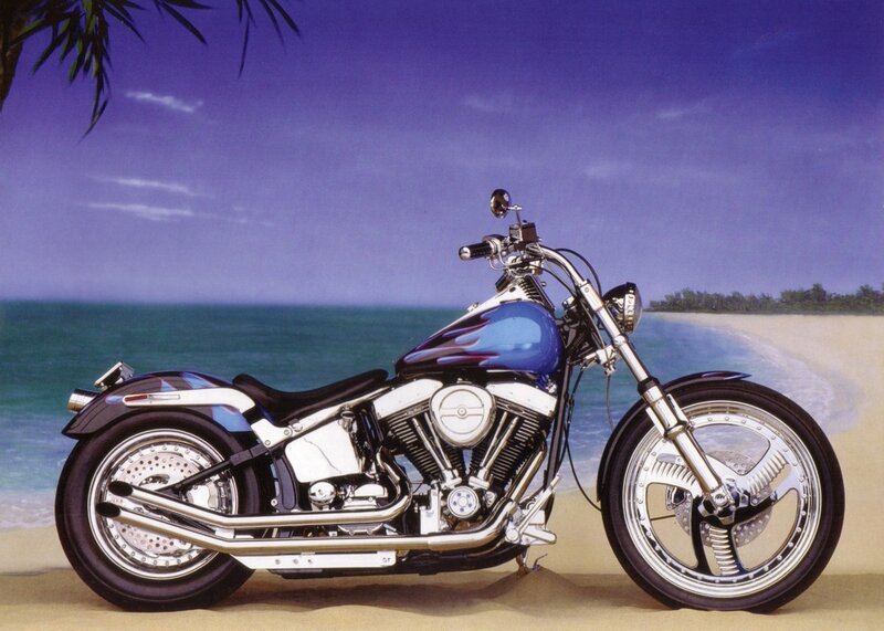 Blue motorcycle on beach