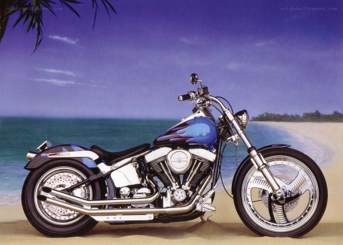 Blue motorcycle on beach