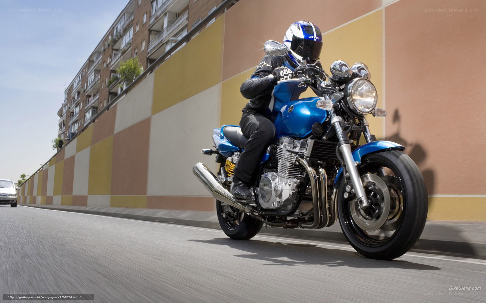 Blue motorcycle on city street