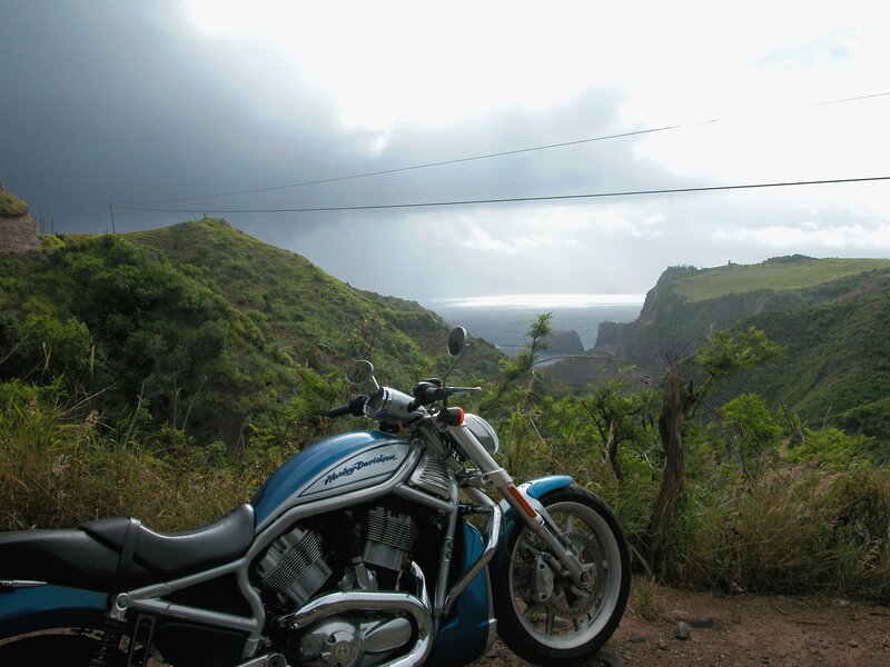 Blue Motorcycle on Cliff — Dramatic, Photograph, Ocean