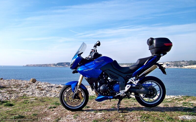 Blue Motorcycle on Coast — Serene