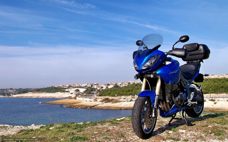 Blue Motorcycle on Coast