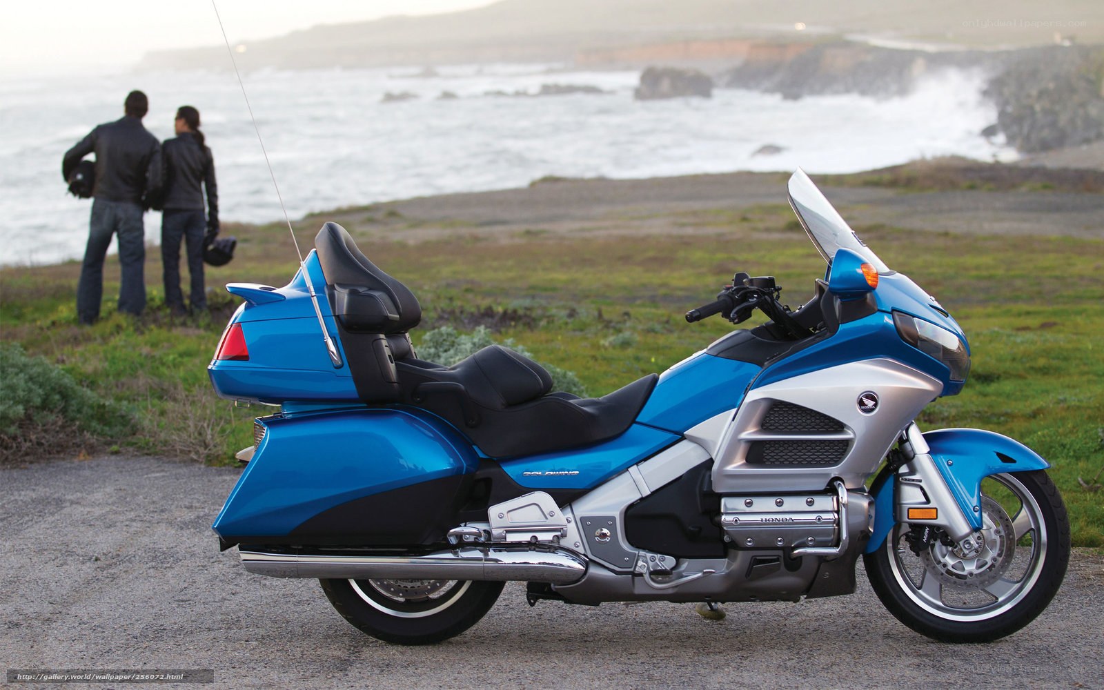 Blue motorcycle on coastal road