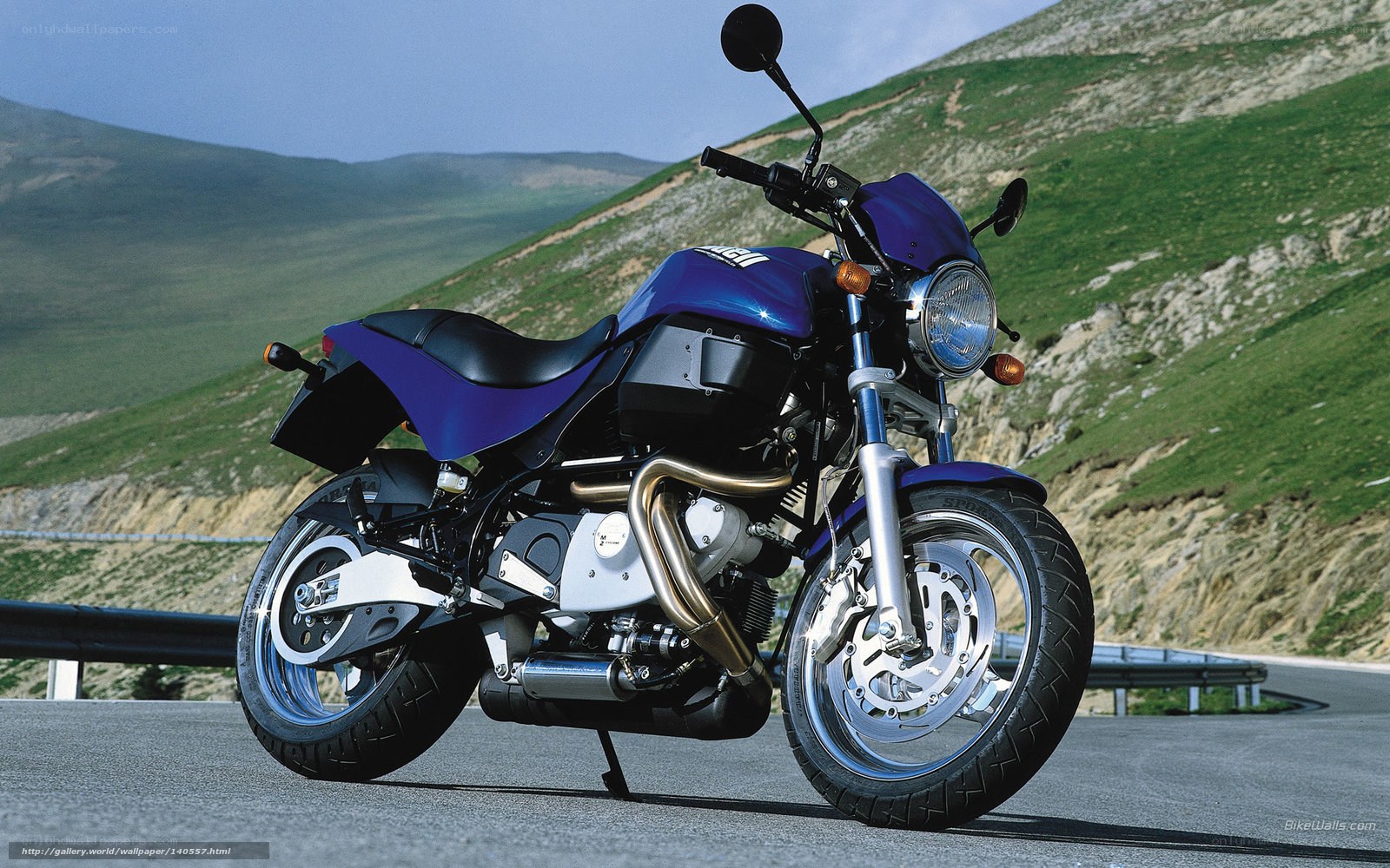 Blue motorcycle on mountain road