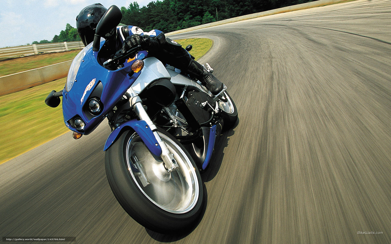 Blue motorcycle on racetrack