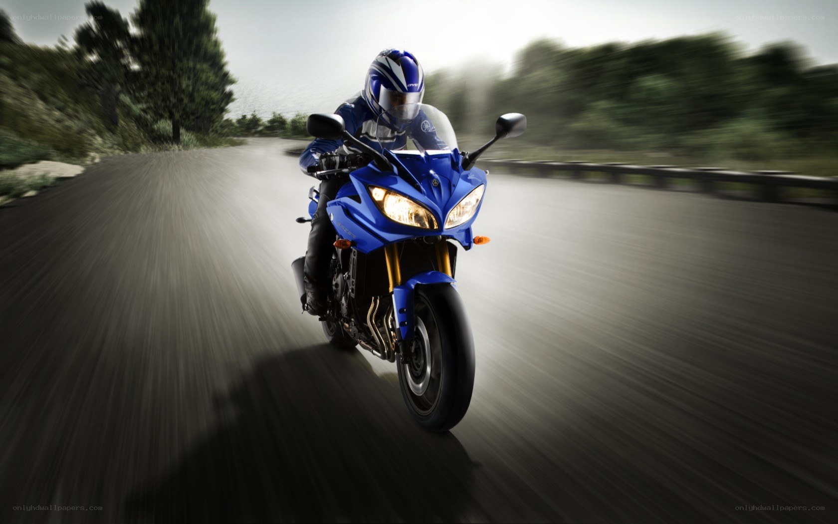 Blue motorcycle on road