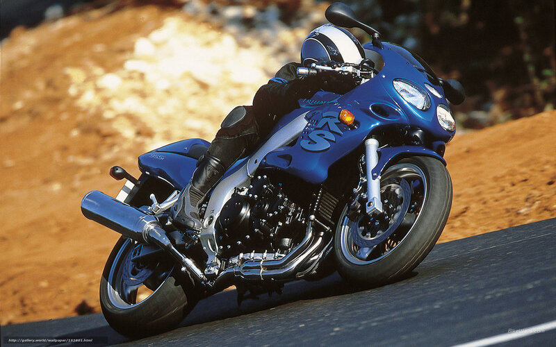 Blue Motorcycle on Road — Dynamic, Afternoon, Photograph