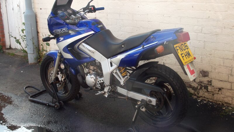 Blue Motorcycle on Stand