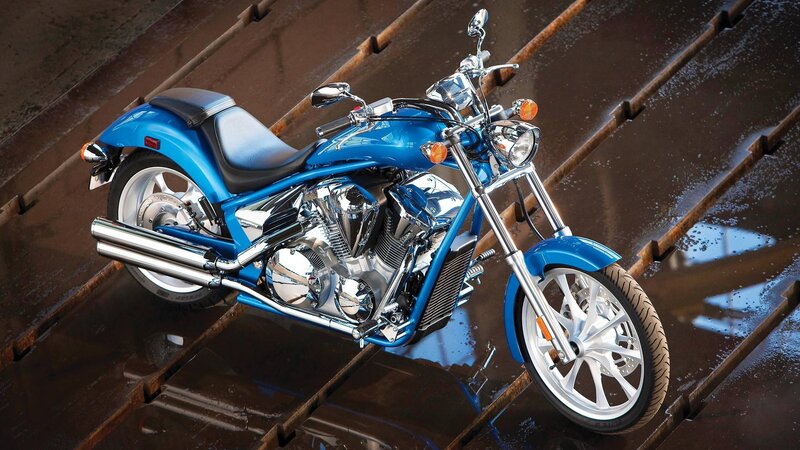 Blue Motorcycle on Tracks