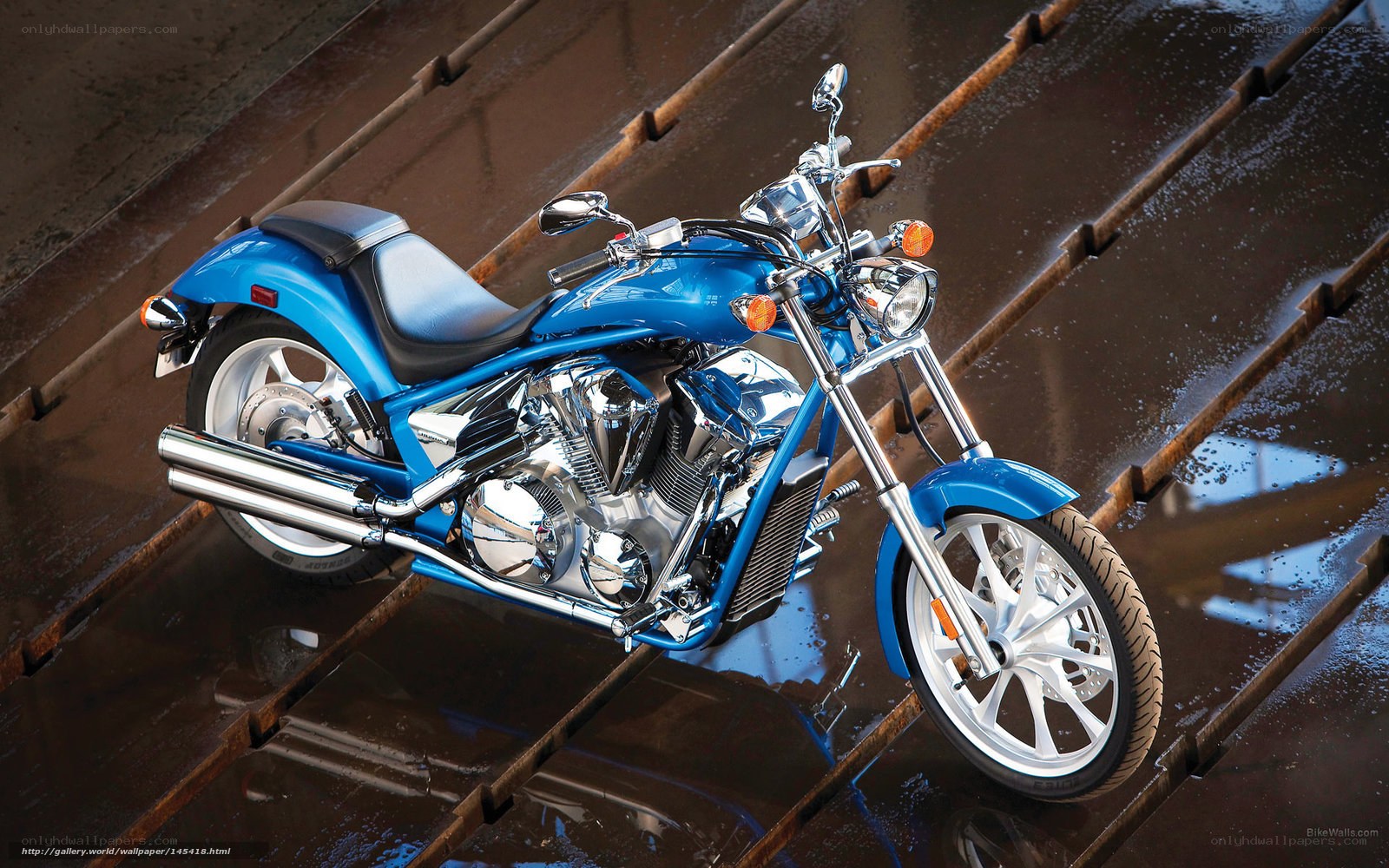 Blue motorcycle on wet surface