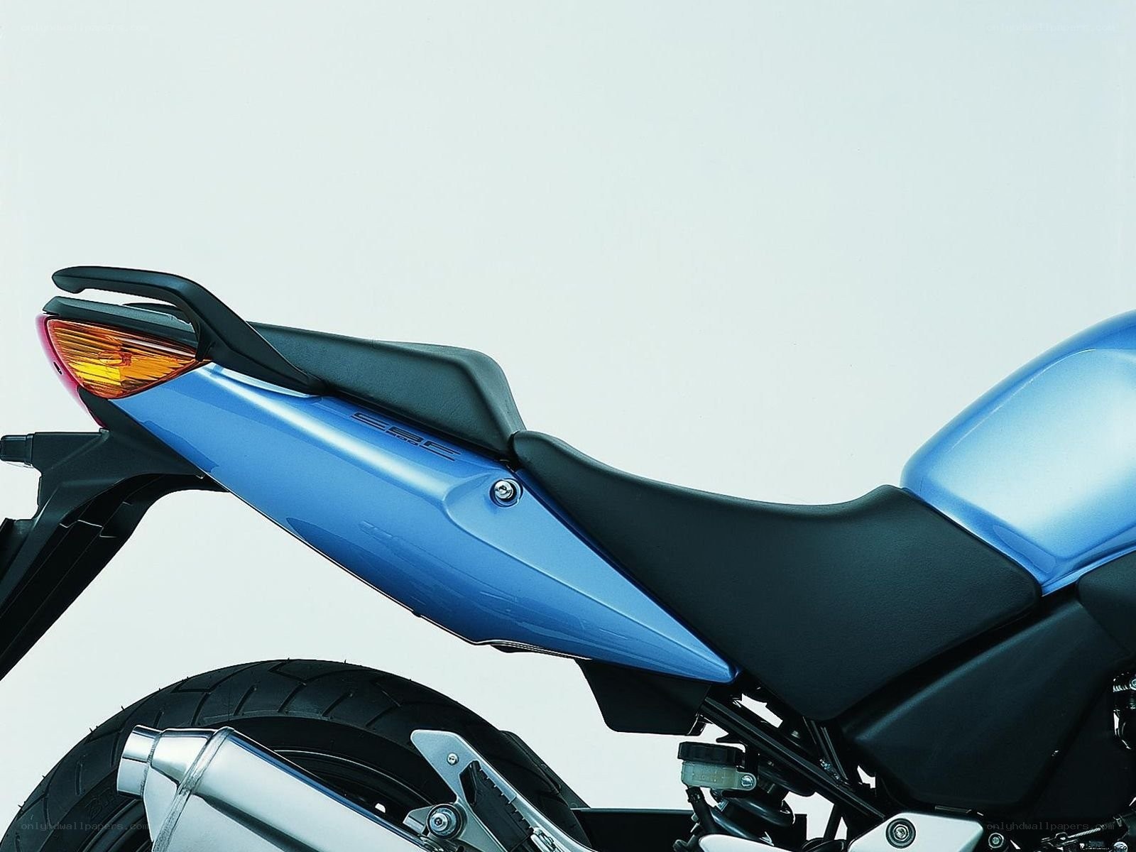 blue motorcycle rear view