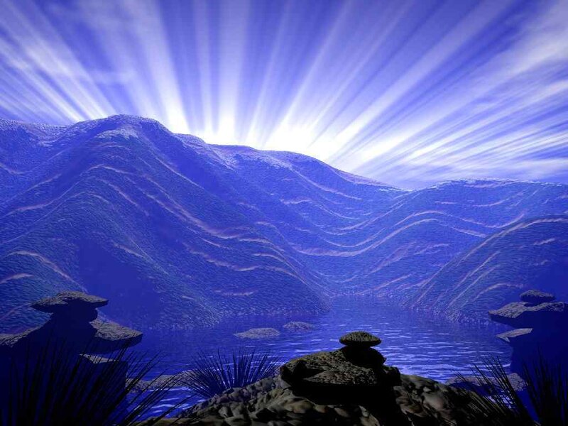 blue mountain landscape with sun rays