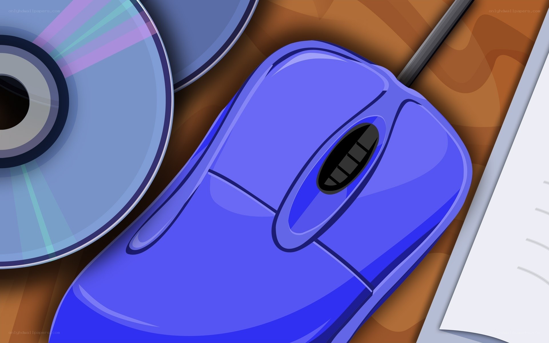 blue mouse and cd on desk