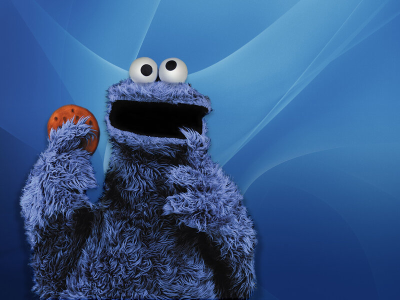 Blue Muppet Holding Cookie — Playful, Photograph