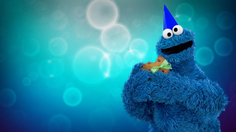 Blue Muppet Holding Cookie