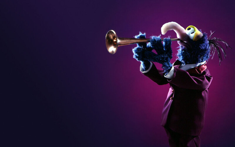 Blue Muppet Playing Trumpet