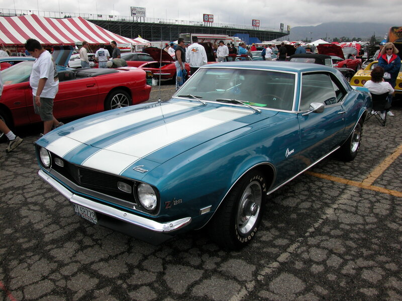 Blue muscle car at a car show