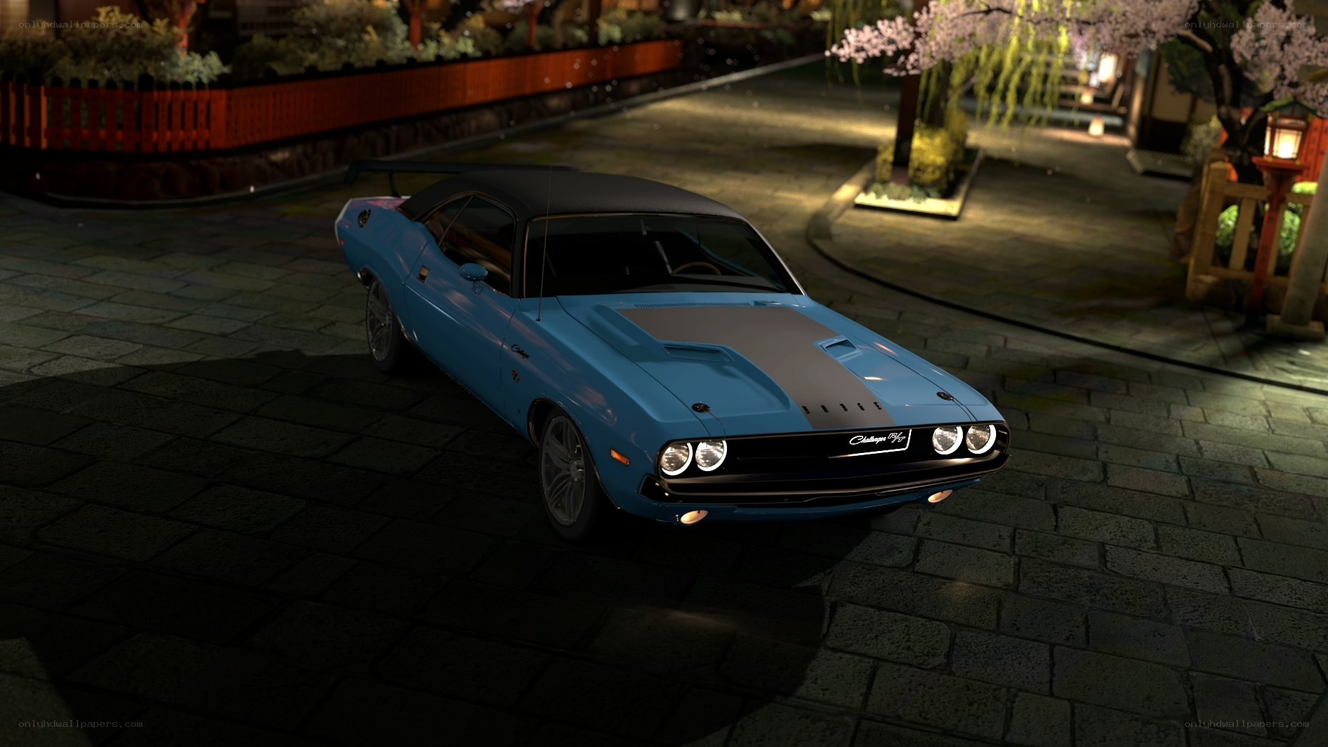 Blue muscle car at night
