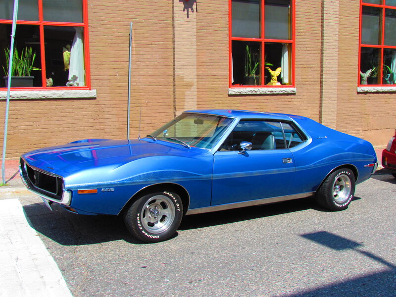 Blue Muscle Car — Calm, Afternoon, Photograph, Brick Building