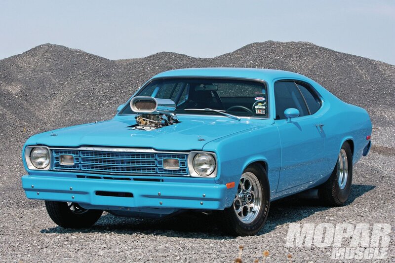 Blue Muscle Car — Dramatic, Afternoon, Photograph, Gravel Pile