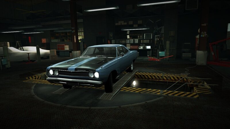 Blue muscle car in garage