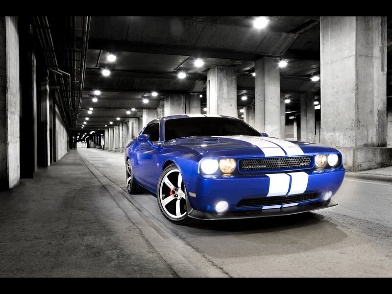 Blue muscle car in parking garage