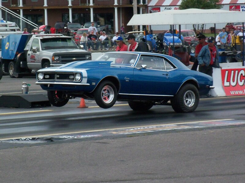 blue muscle car on drag strip