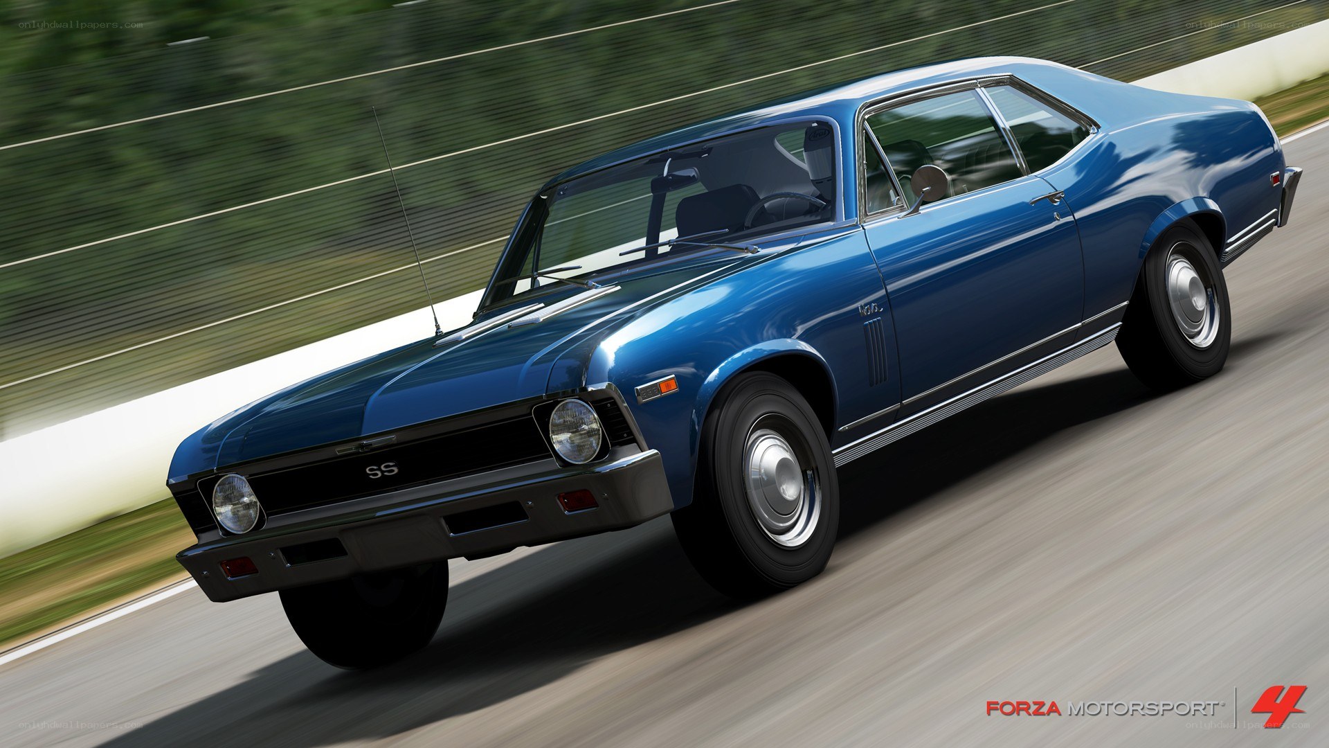 blue muscle car on track