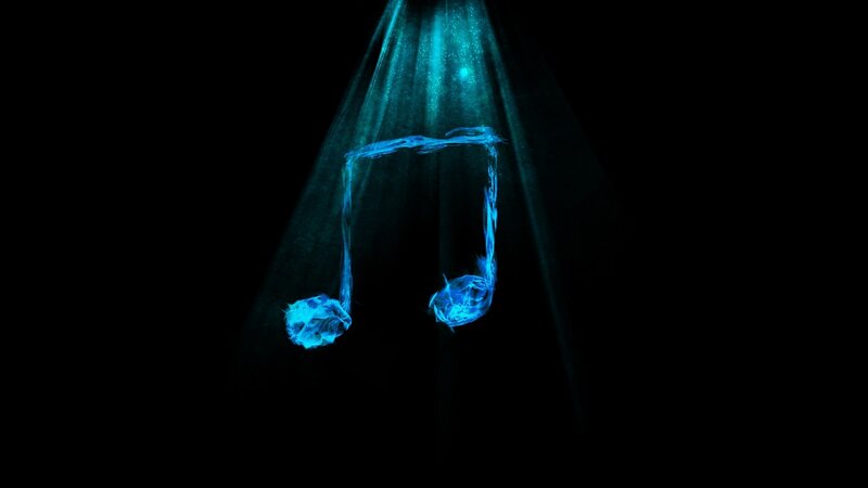 blue musical notes in spotlight