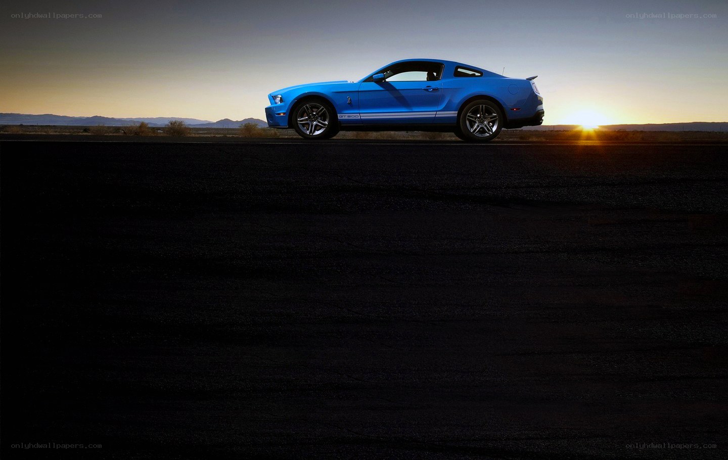 Blue Mustang at sunset