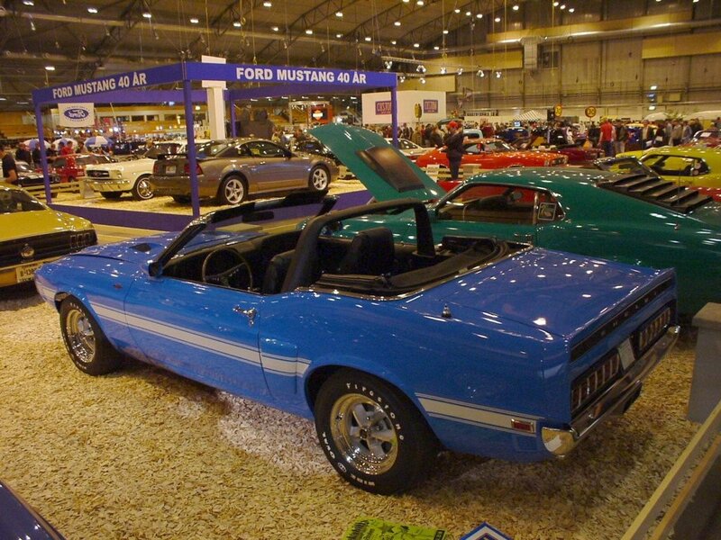 Blue Mustang convertible at car show