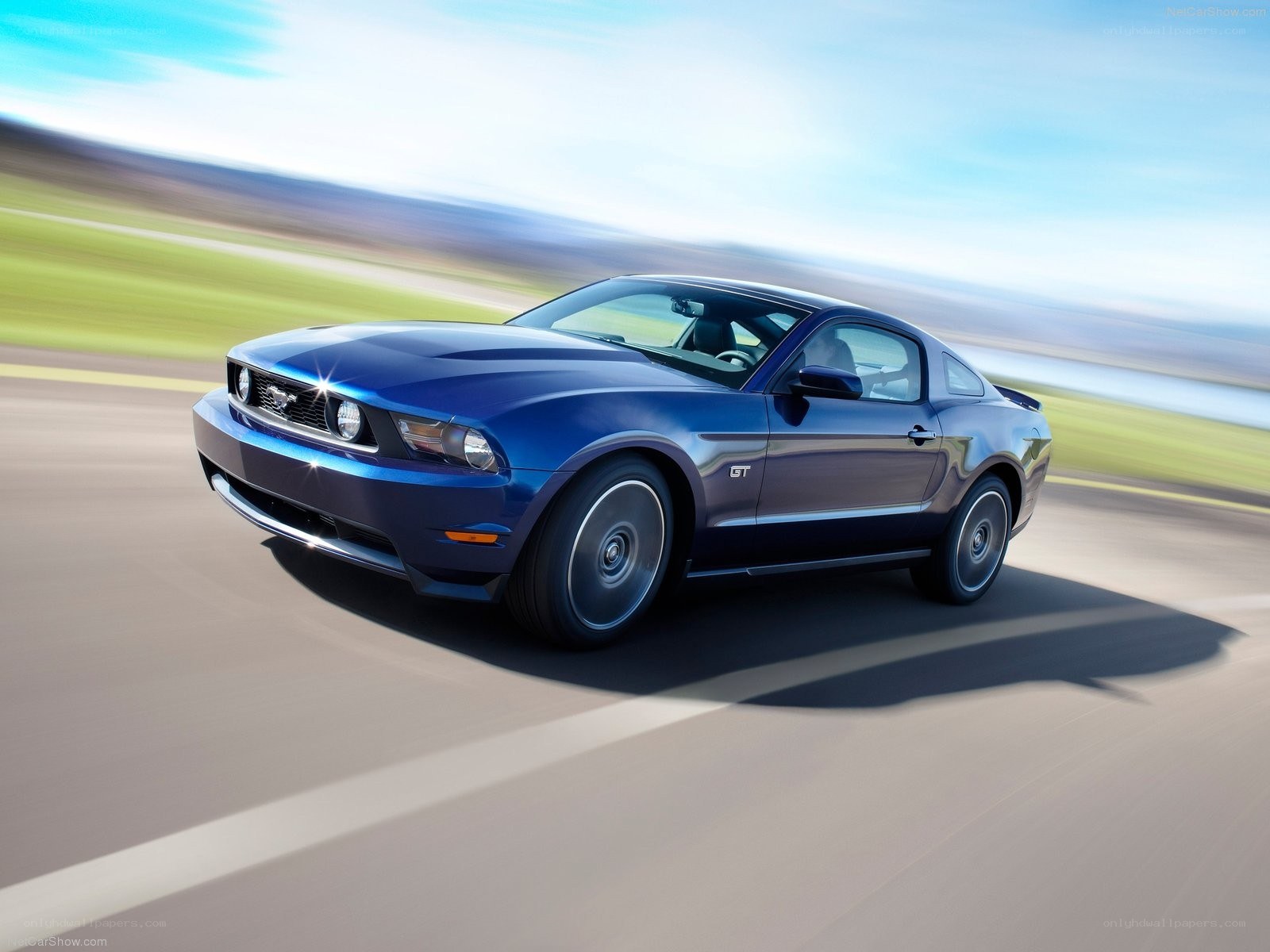 blue mustang gt in motion