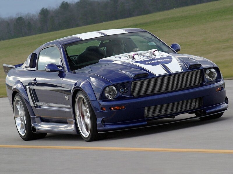 blue mustang on a track