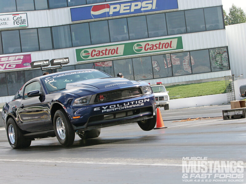 Blue Mustang on Track