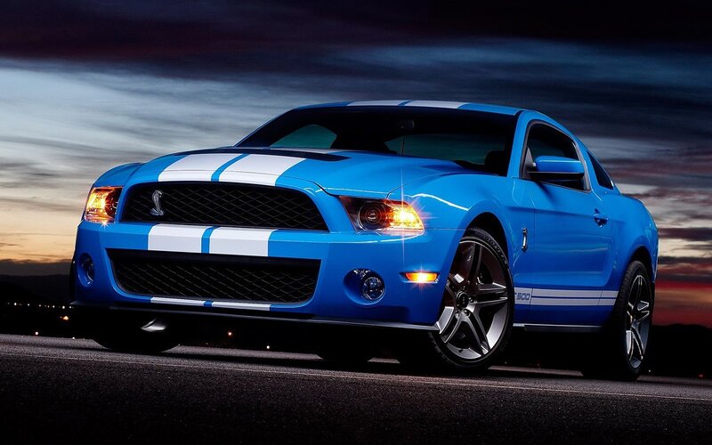 blue mustang with racing stripes