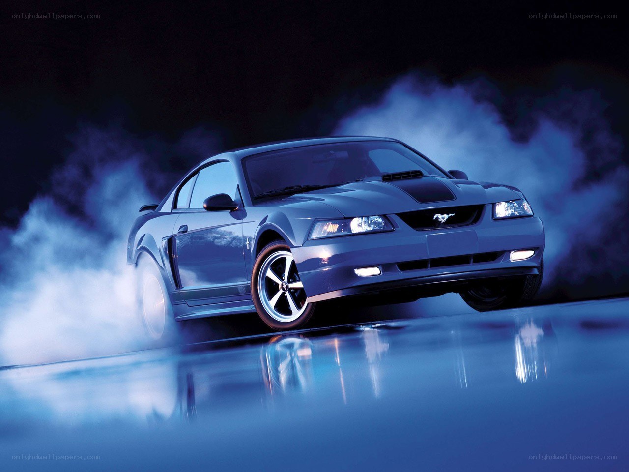 Blue Mustang with smoke