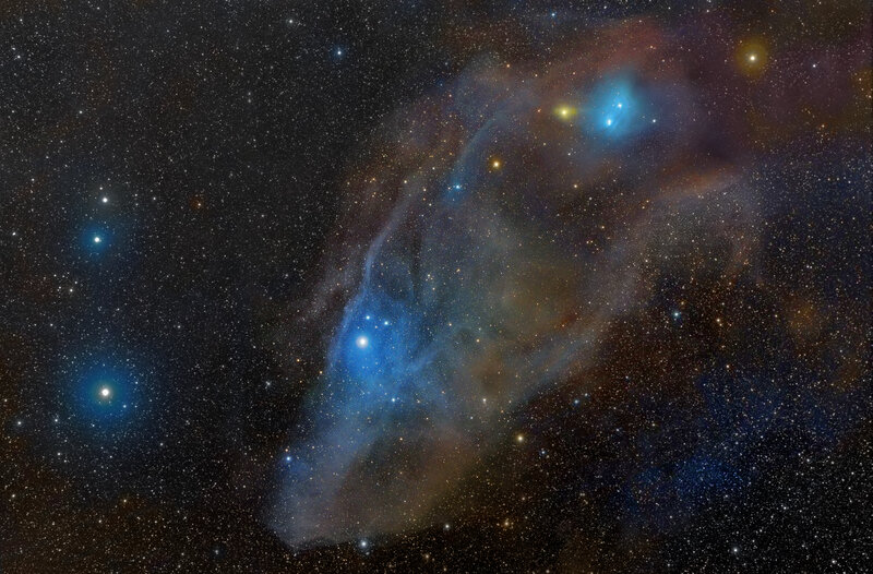 Blue nebula in star field