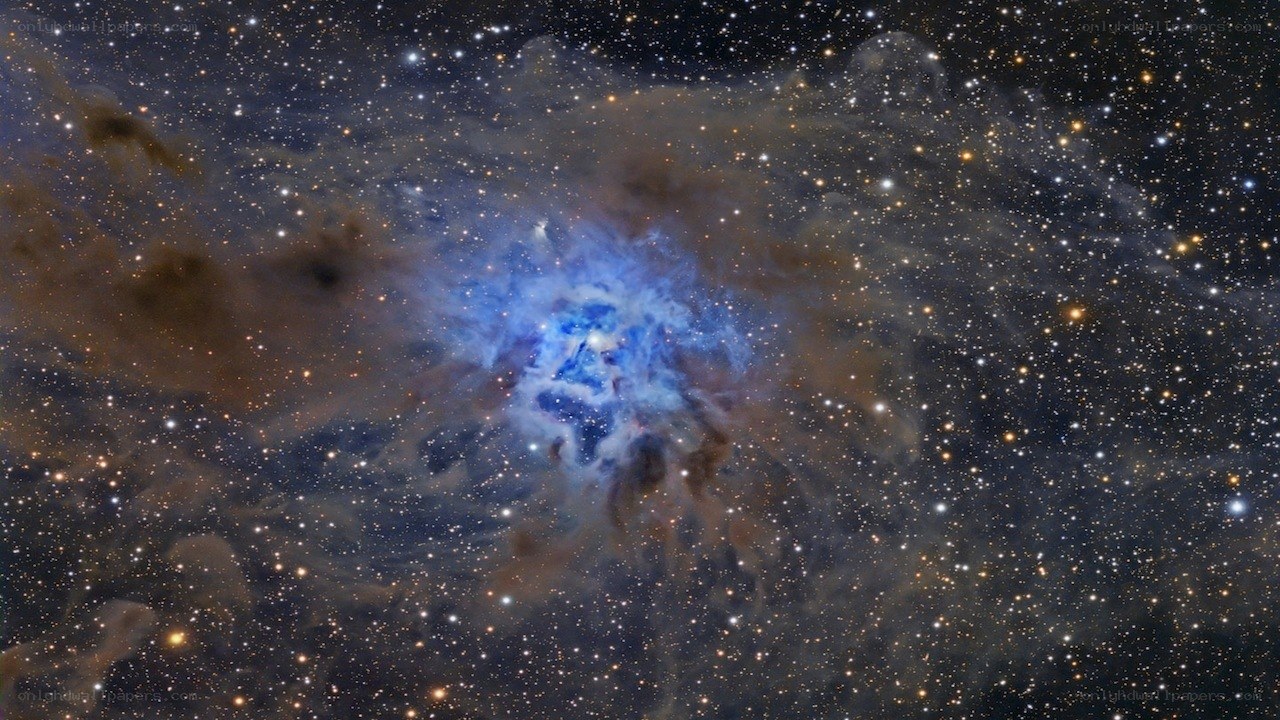 Blue nebula in star field