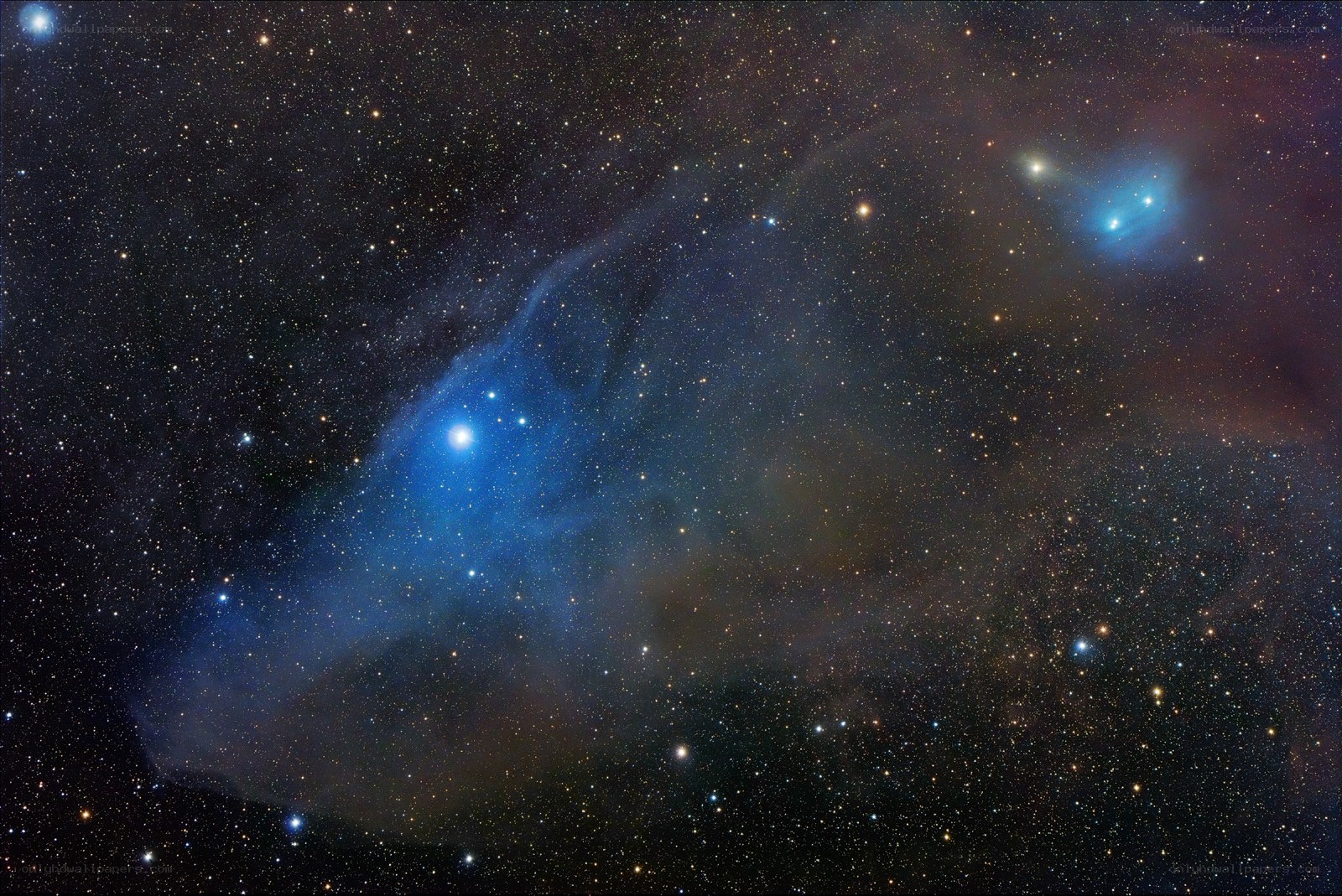 Blue nebula in star field