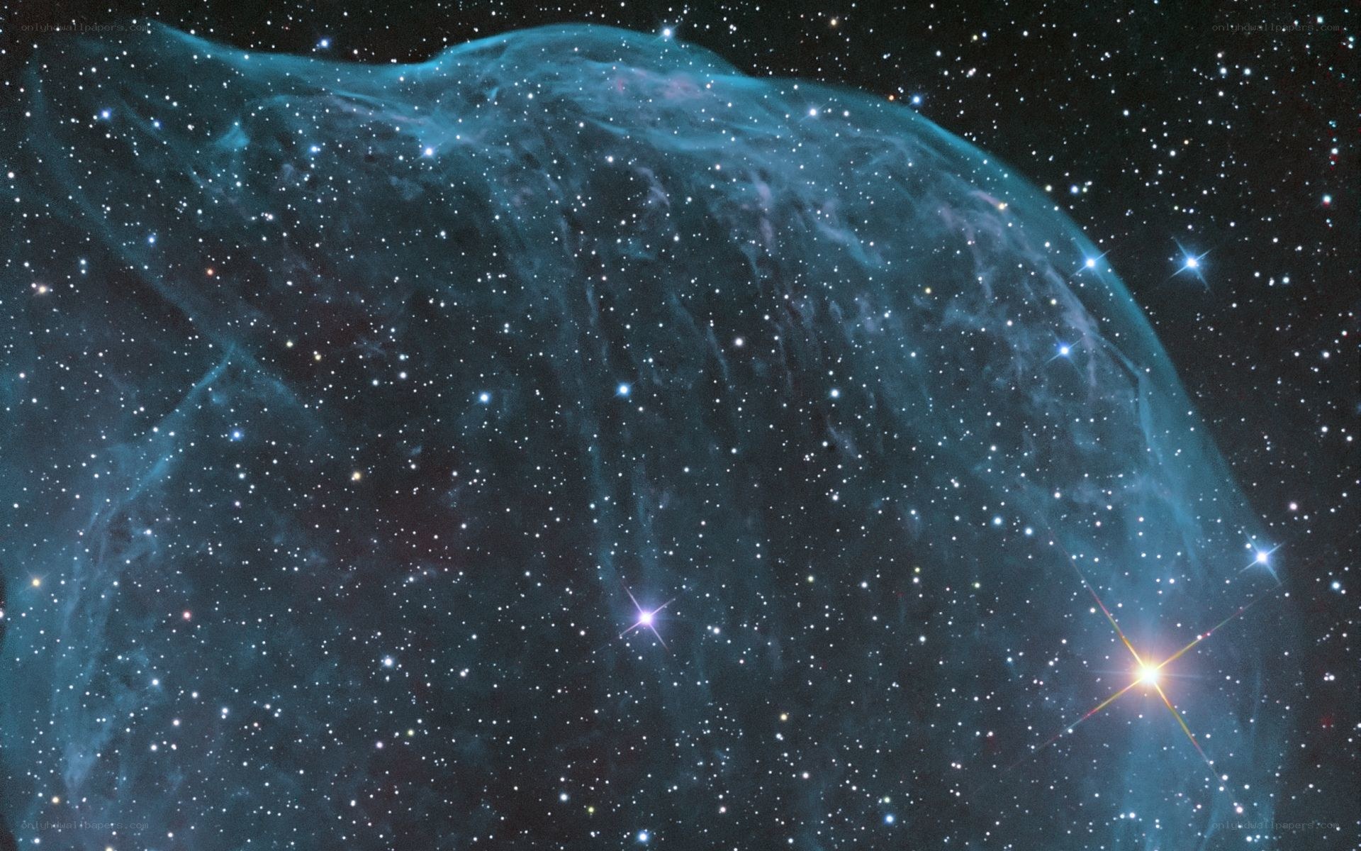 Blue nebula in star field