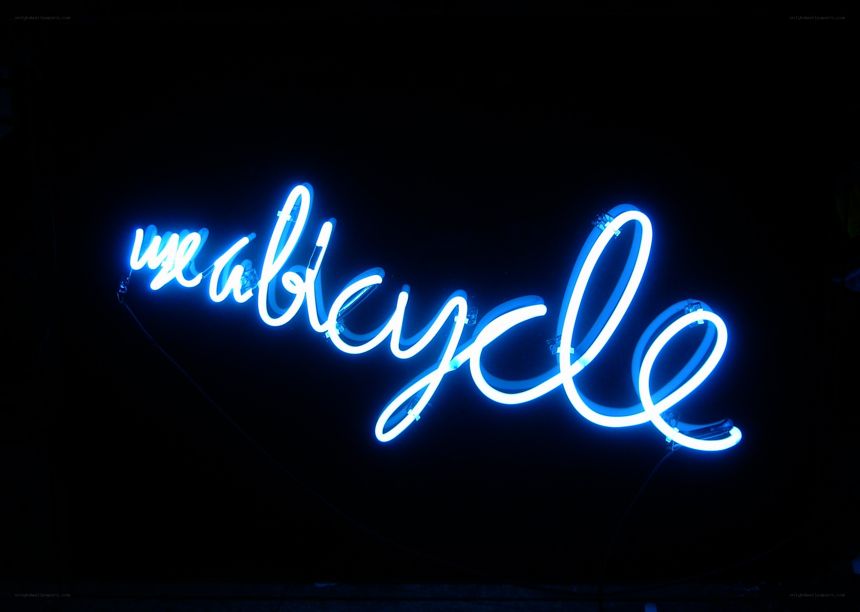 blue neon sign reading 'weabycle'